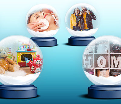 Snowglobes containing representations of different trends on a blue background