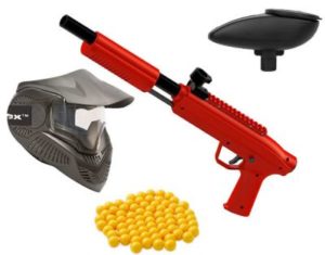 Paintball products, including a mask, paintball hopper, red paintball shotgun, and a supply of yellow paintballs.